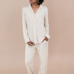 Woman modeling Long-Sleeved Women's Pajama Set in Bisque with Cloud Trim on a tan backdrop