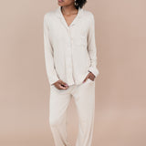 Woman modeling Long-Sleeved Women's Pajama Set in Bisque with Cloud Trim on a tan backdrop