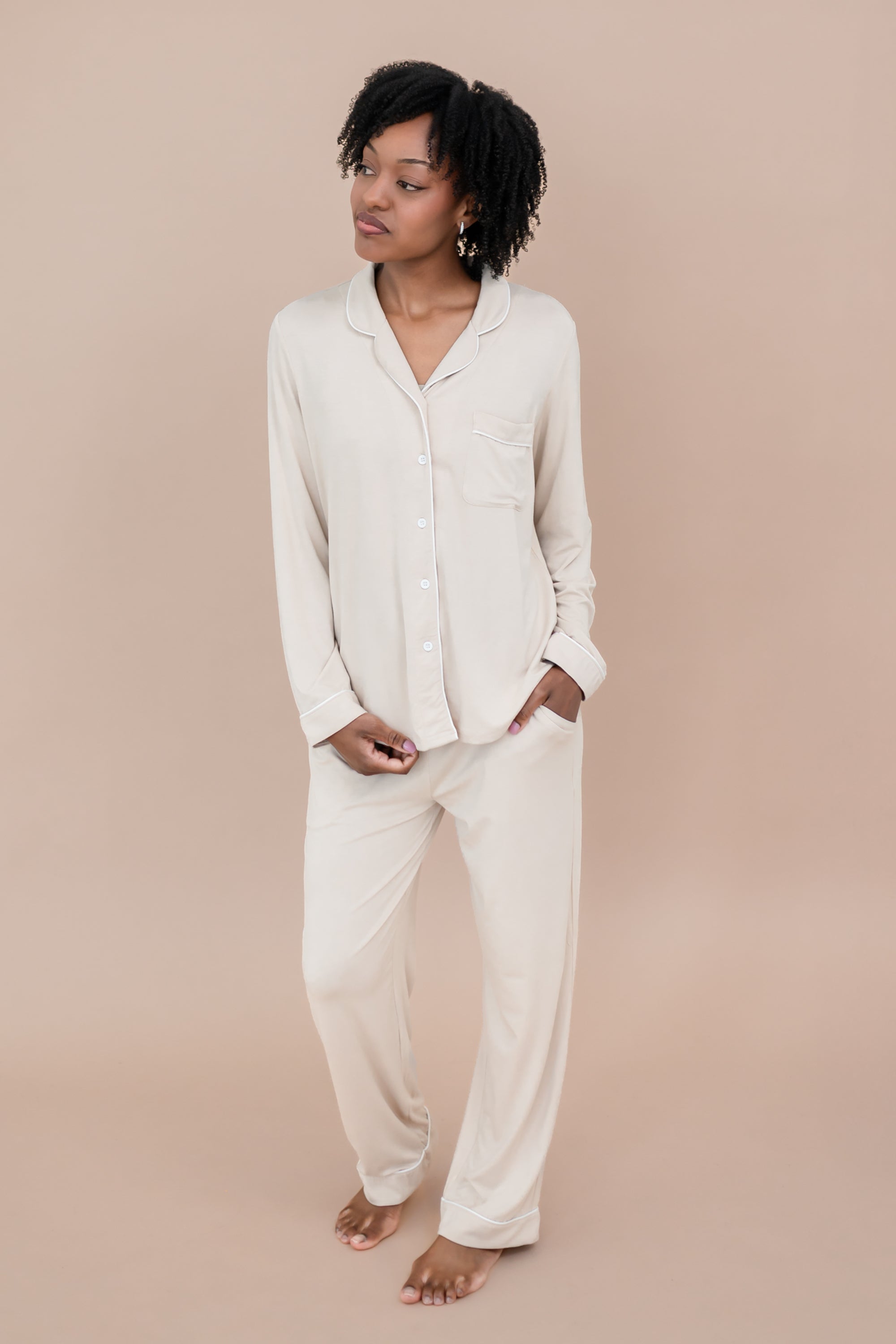 Woman modeling Long-Sleeved Women's Pajama Set in Bisque with Cloud Trim on a tan backdrop