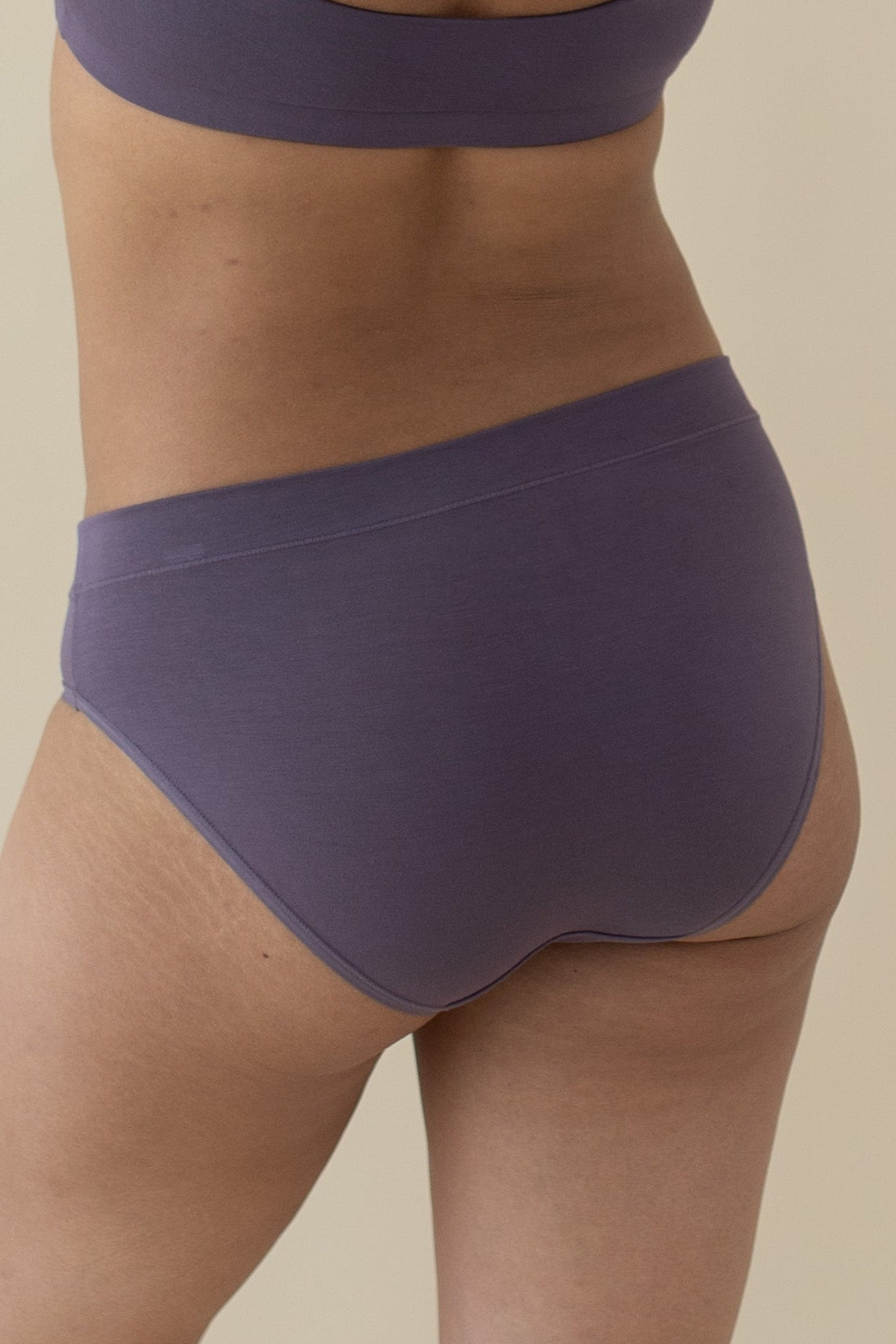 Woman modeling Women's Midi Brief in Currant showing back