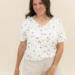 Woman modeling Women's Relaxed Fit V-Neck in Road Trip with khaki linen shorts