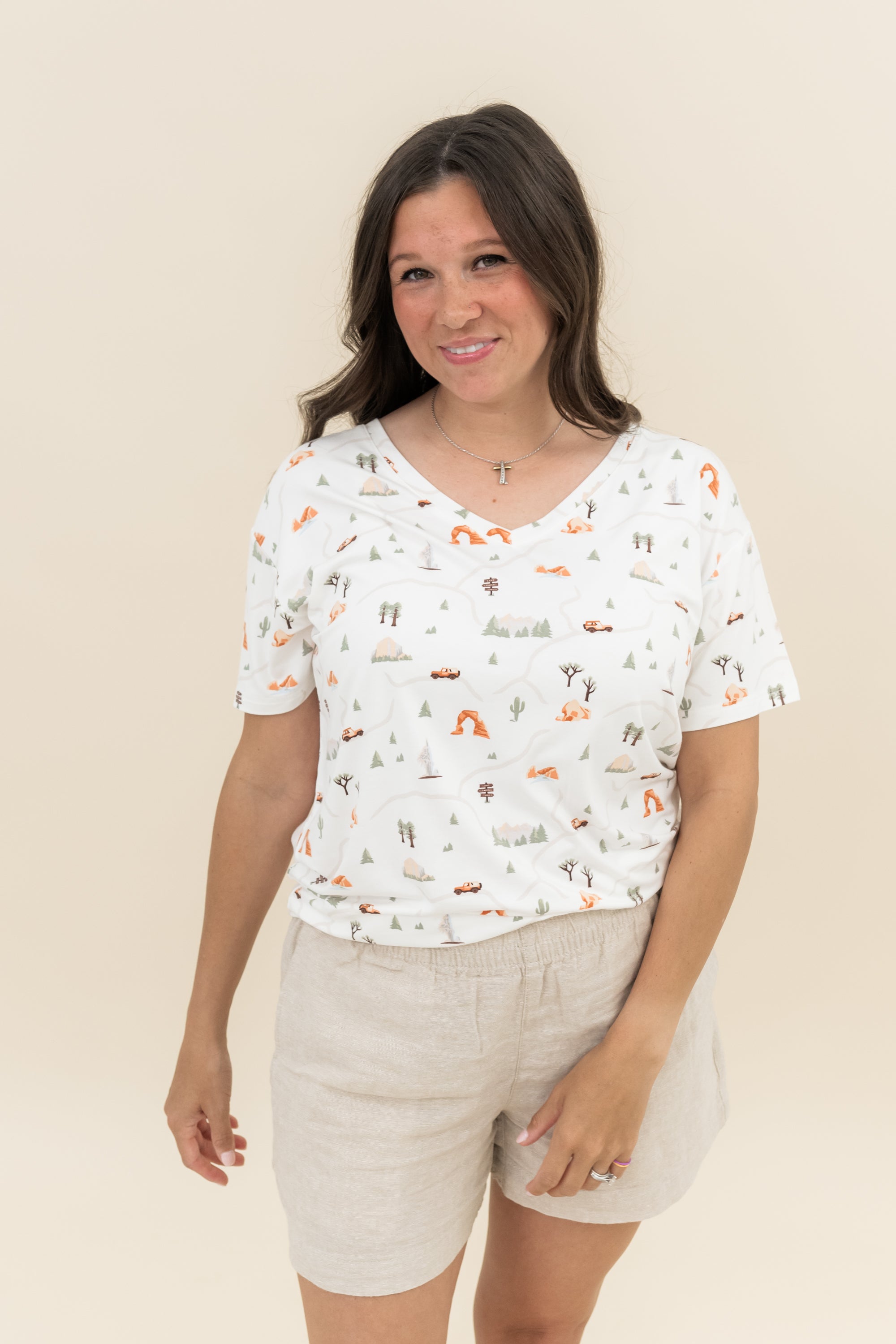 Woman modeling Women's Relaxed Fit V-Neck in Road Trip with khaki linen shorts