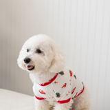 The side view of the Dog Tee in Santa Sleigh shown on a small white dog