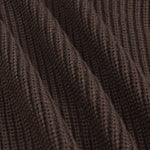 Close-up of a dark brown ribbed knit fabric texture with soft folds and a fine woven pattern.