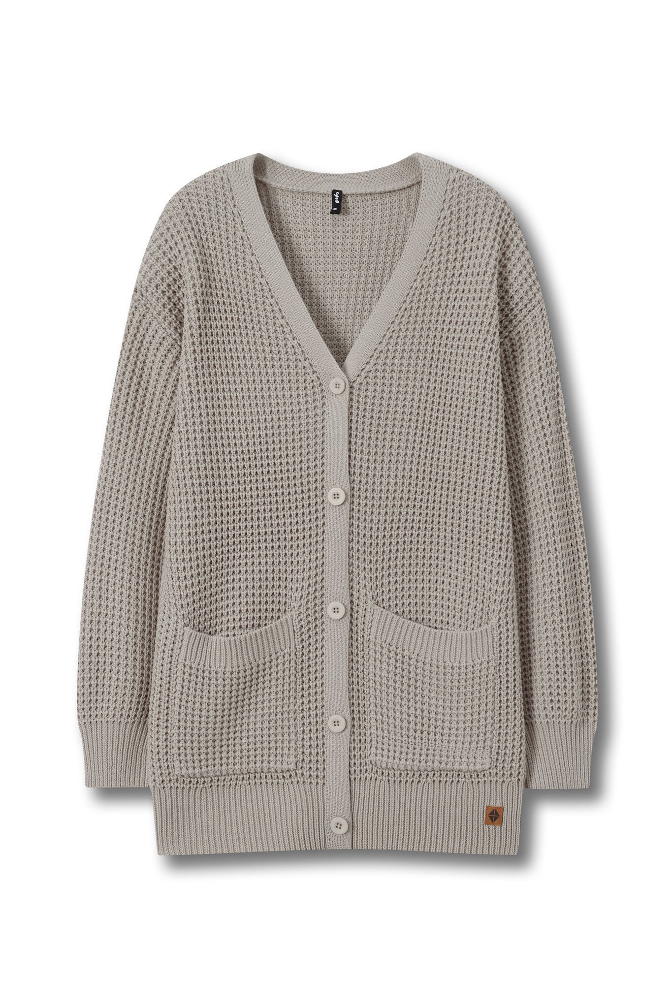 A light taupe waffle-knit cardigan sweater with a V-neck, button-up front, and two front patch pockets, shown flat on a white background.