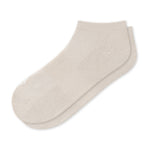 A pair of low-cut ankle socks in a light cream or off-white color, displayed against a solid white background.