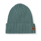 Chunky Knit Adult Ribbed Beanie in pine on a white background
