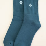 Adult Crew Socks in Atlantic shown side by side on a light neutral background