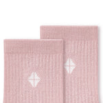 Close up of adult Crew Socks in Blush laying flat on a white background.