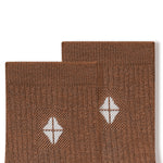 Close up of adult Crew Socks in Latte laying flat on a white background.