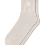 Adult Crew Socks in Oat laying flat on a white background.