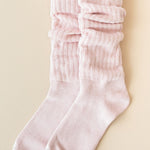 Flat lay of Kyte Scrunch Socks in Blush 