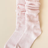 Flat lay of Kyte Scrunch Socks in Blush 