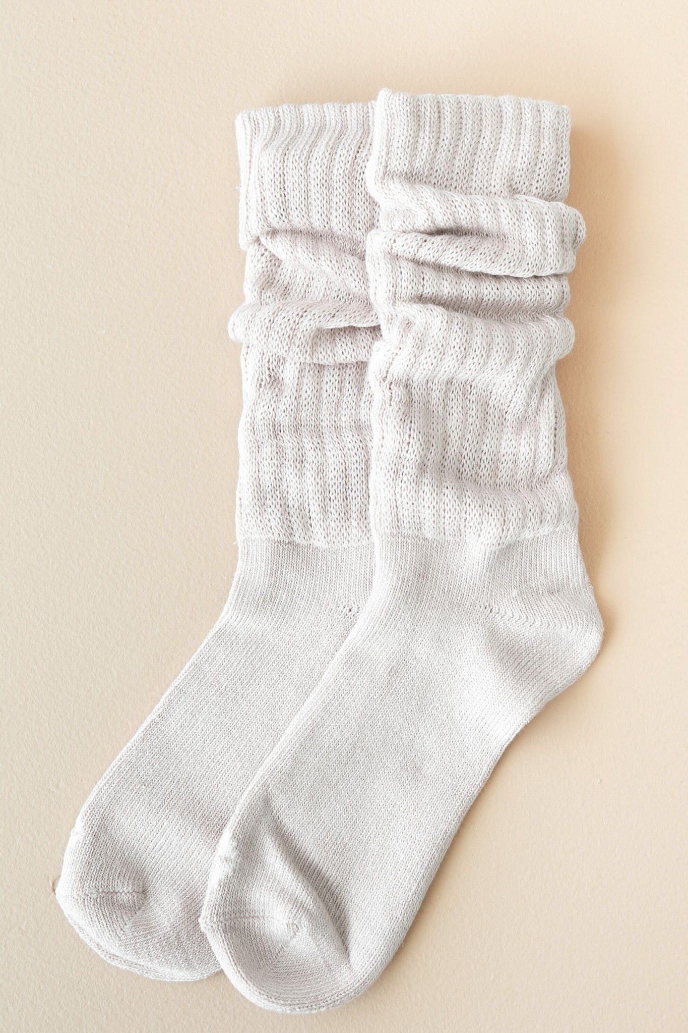Flat lay of Kyte Scrunch Socks in Oat