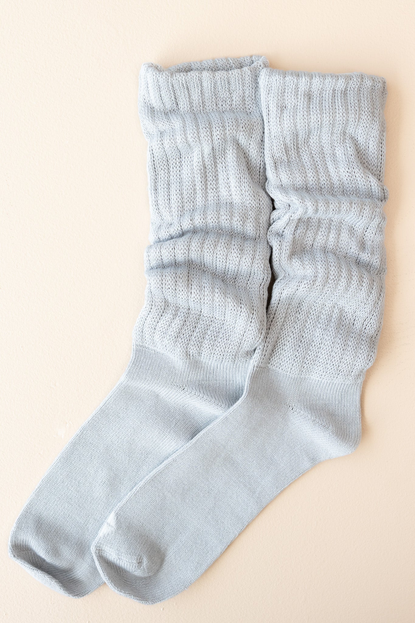 Flat lay of Kyte Scrunch Socks in Storm