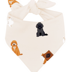 Dog bandana with cartoon dog designs on a white background