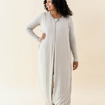 Female model wearing the Adult Sleep Bag Walker in Almond