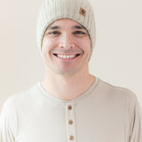 Man modeling Chunky Knit Ribbed Beanie in Almond close up