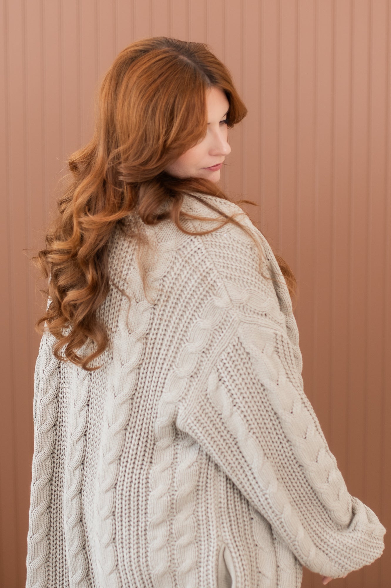 Close up of back of Chunky Knit Cable Cardigan in Almond