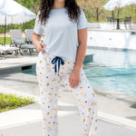 Model wearing the Women's Lounge Pants in Amalfi Coast while standing on a pool deck 

::: Model is 5'9" wearing size L ///