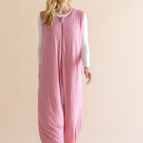 Smiling model looking to the side walking while wearing the Adult Sleep Bag Walker in Apple Blossom

::: Model is 5'9" wearing size S ///