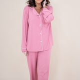 Model wearing the Long Sleeve Pajama Set in Apple Blossom with Cloud Trim