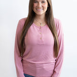 Model wearing the Women's Ribbed Henley Top in Apple Blossom