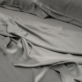 Bamboo Sateen Sheet Set in Ash shown on a bed