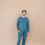 Smiling male model wearing Men's Jogger Set in Atlantic