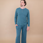 Male model wearing the Long Sleeve Henley Top in Atlantic and matching Lounge Pants