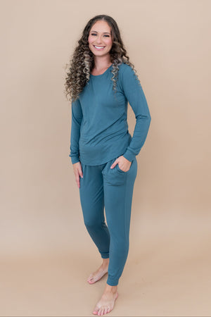 Model wearing Women's Long Sleeve Jogger Set in Atlantic blue