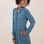 Woman smiling to the side while modeling the Women's Sleep Shirt in Atlantic