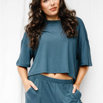 Brunette model wearing the Women's Short Sleeve Tee in Atlantic