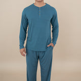 Smiling model wearing Men's Lounge Pants in Atlantic and matching Long Sleeve Henley Top 