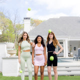 Models standing together wearing the Spring Bamboo Flex sets in Basil, Thistle and Midnight
