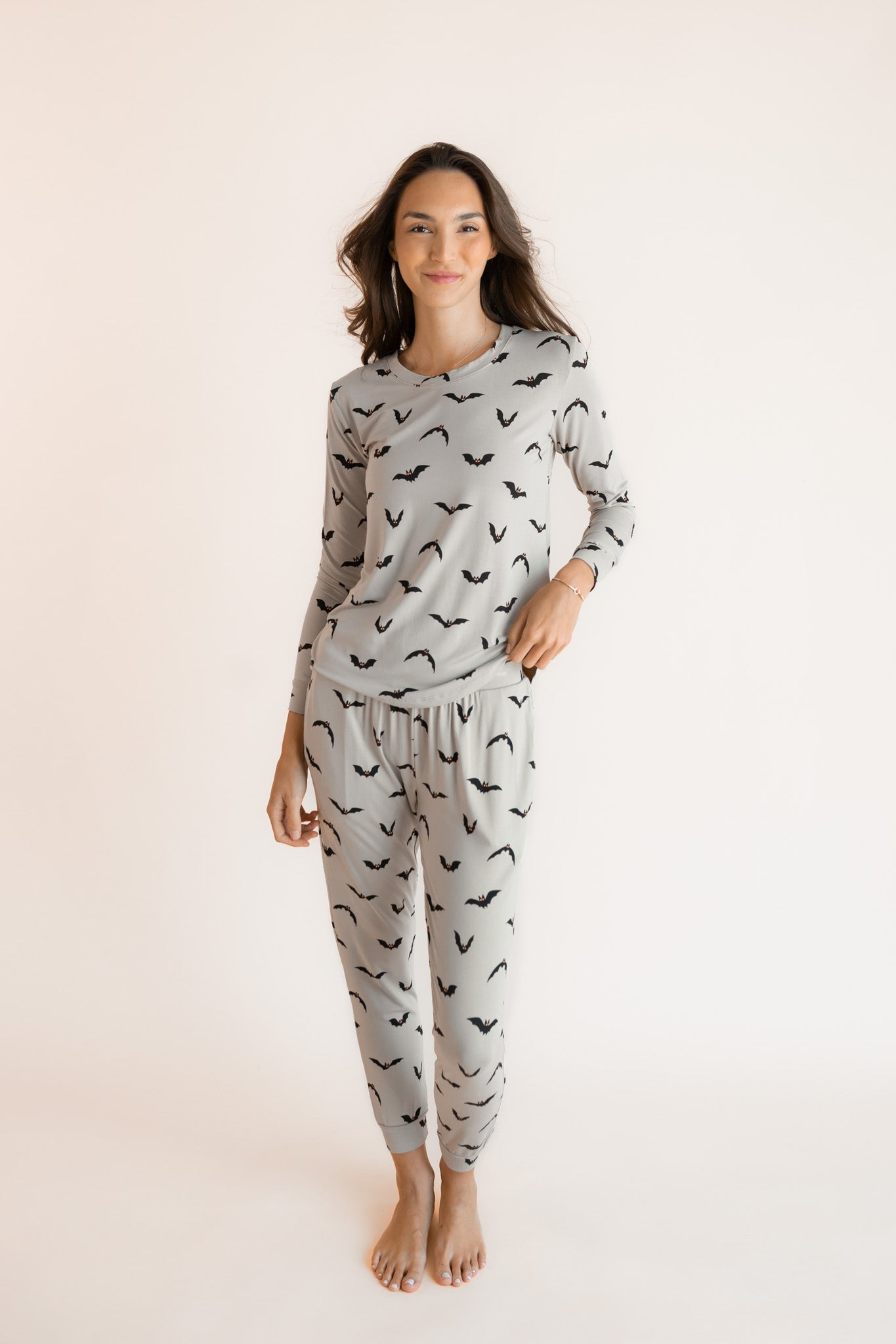 Modal wearing Women's Jogger Pajama Set in Bats print on a white background ::: Model is 5'9.5" wearing size XS ///