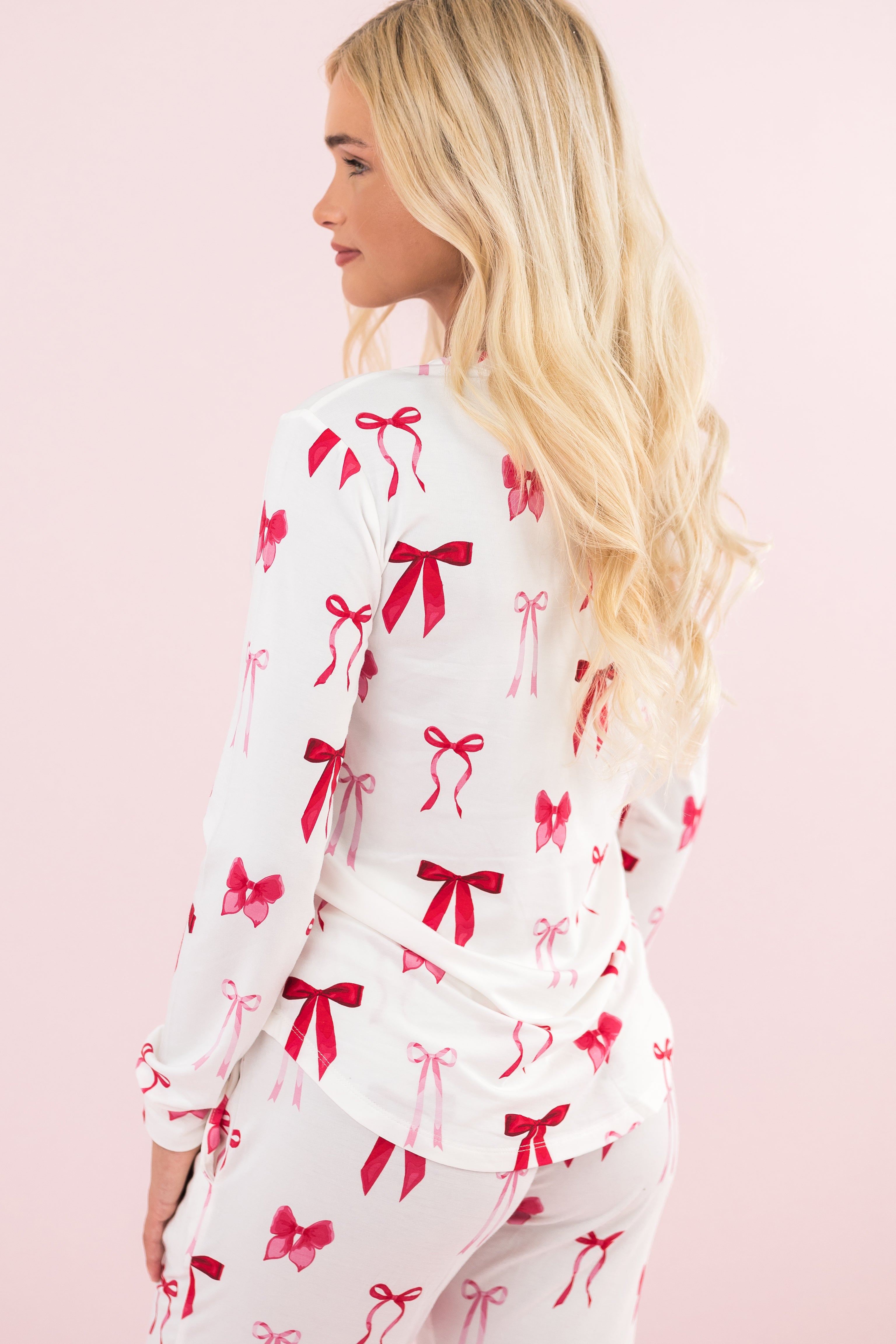 Model showing the back of the Bamboo Women's Jogger Pajama Set in Big Love Bow