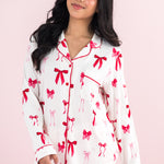 Close up of a model wearing the Bamboo Long-Sleeved Women's Pajama Set in Big Love Bow