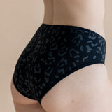 Close up of the back side of the Women’s Underwear in Midnight Leopard on a model 