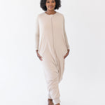 Model wearing the Adult Sleep Bag Walker in Bisque with hands to the side