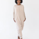 Model wearing the Adult Sleep Bag Walker in Bisque with hands to the side