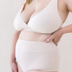 Woman modeling Women's High-Waisted Brief in Blonde and Cross Front Bralette