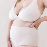 Woman modeling Women's High-Waisted Brief in Blonde and Cross Front Bralette
