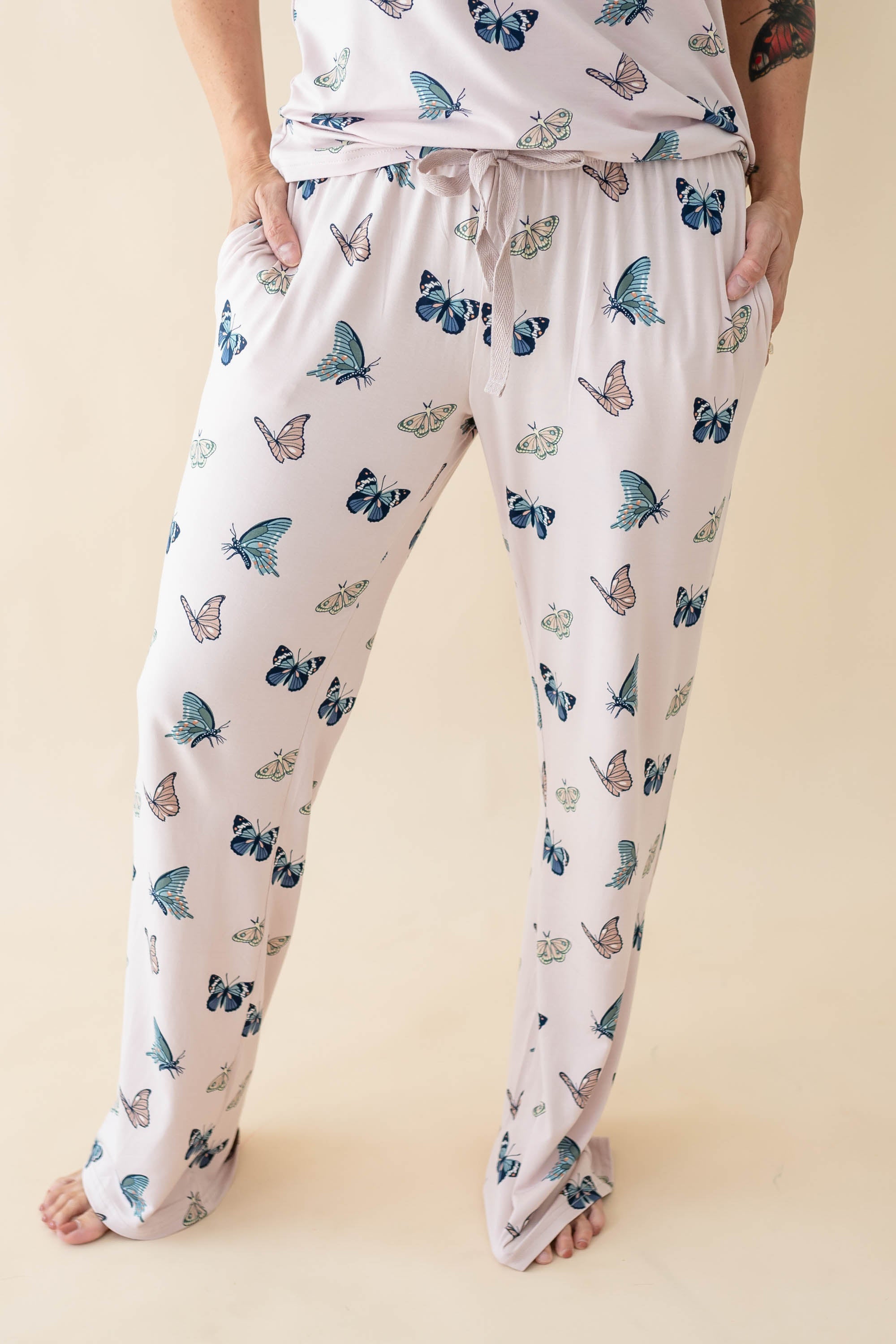Model wearing the Women's Lounge Pants in Blush Butterfly