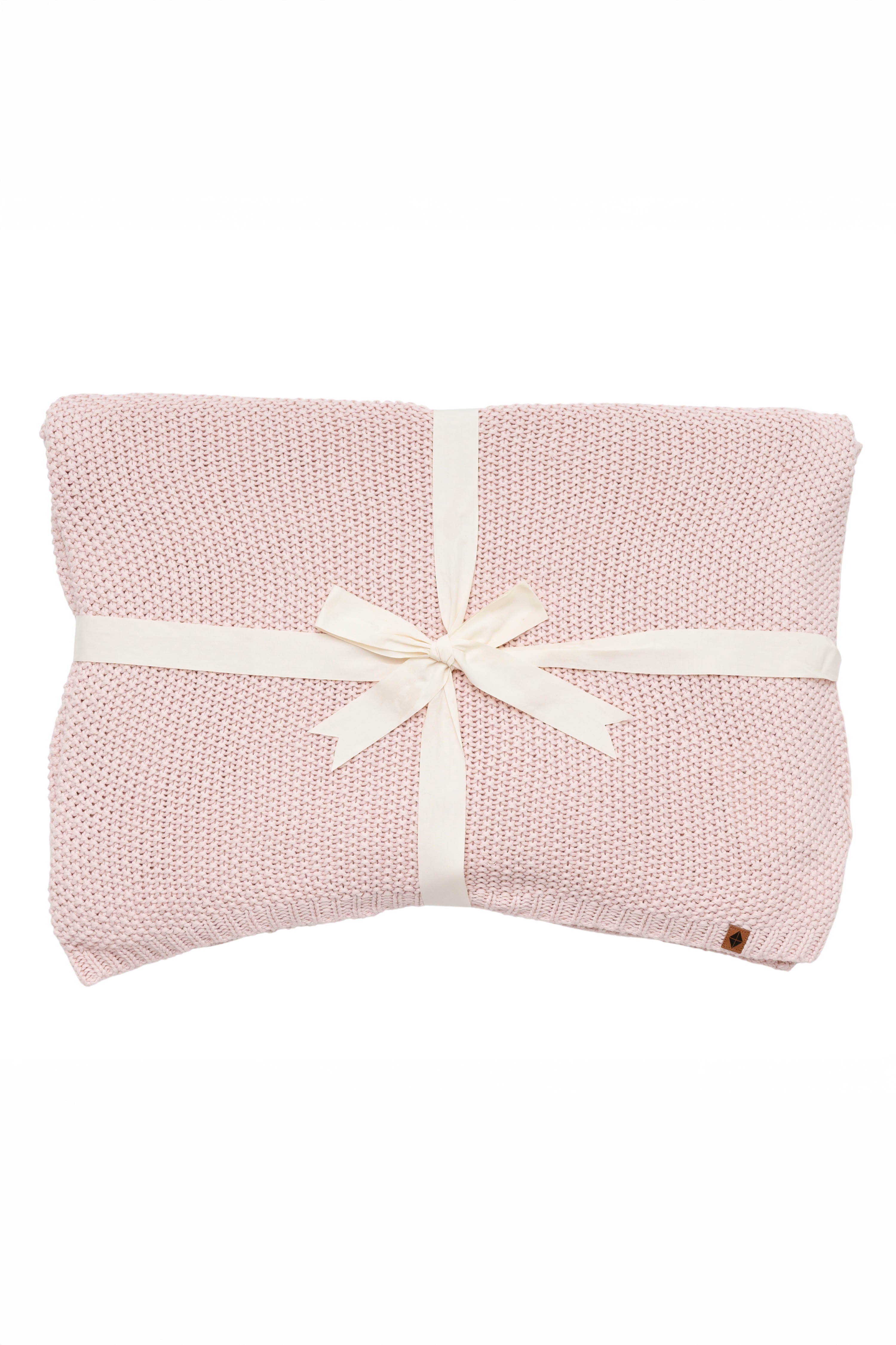 Kyte Baby's Chunky Knit Throw Blanket in Blush
