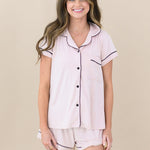 Woman modeling Women’s Short Sleeve Pajama Set in Blush with Midnight Trim