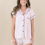 Woman modeling Women’s Short Sleeve Pajama Set in Blush with Midnight Trim