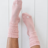 Adult Scrunch Socks in Blush shown on a model