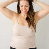 Model wearing the Women’s Camisole in Blush and black pants