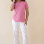 Woman modeling Women's Lounge Pants in Bow and Apple Blossom tee